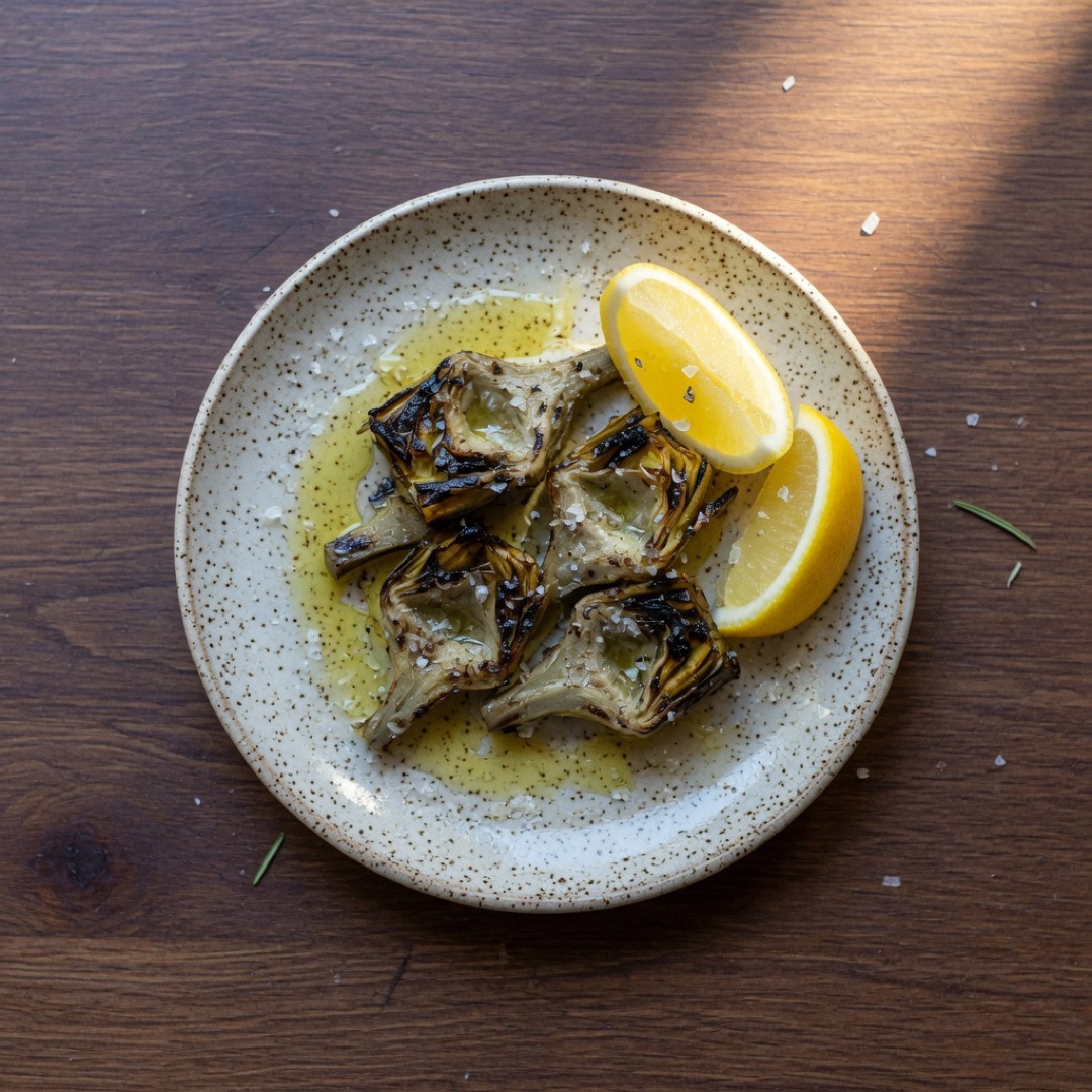 Grilled artichokes on a plate